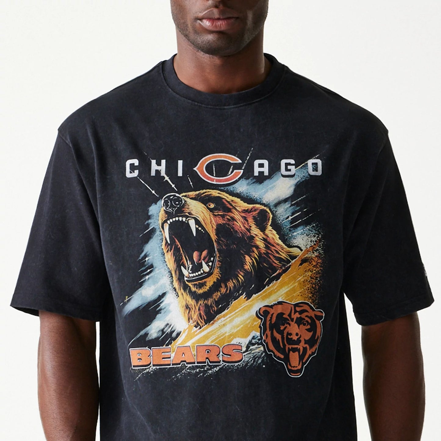 The Male model is wearing Chicago Bears NFL Games Premium Apparel Black Oversized T-Shirt 2