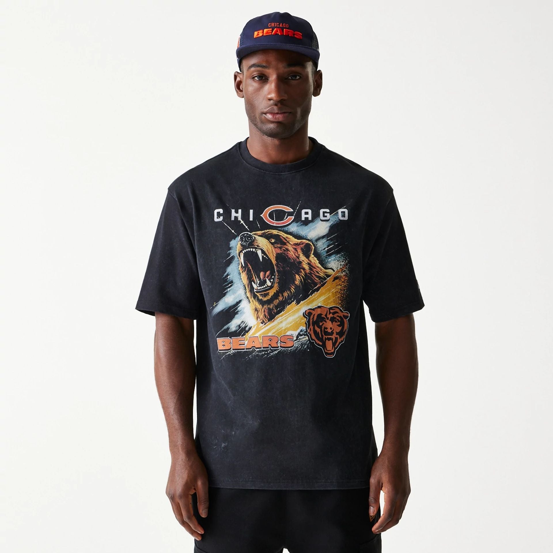 The Male model is wearing Chicago Bears NFL Games Premium Apparel Black Oversized T-Shirt 1