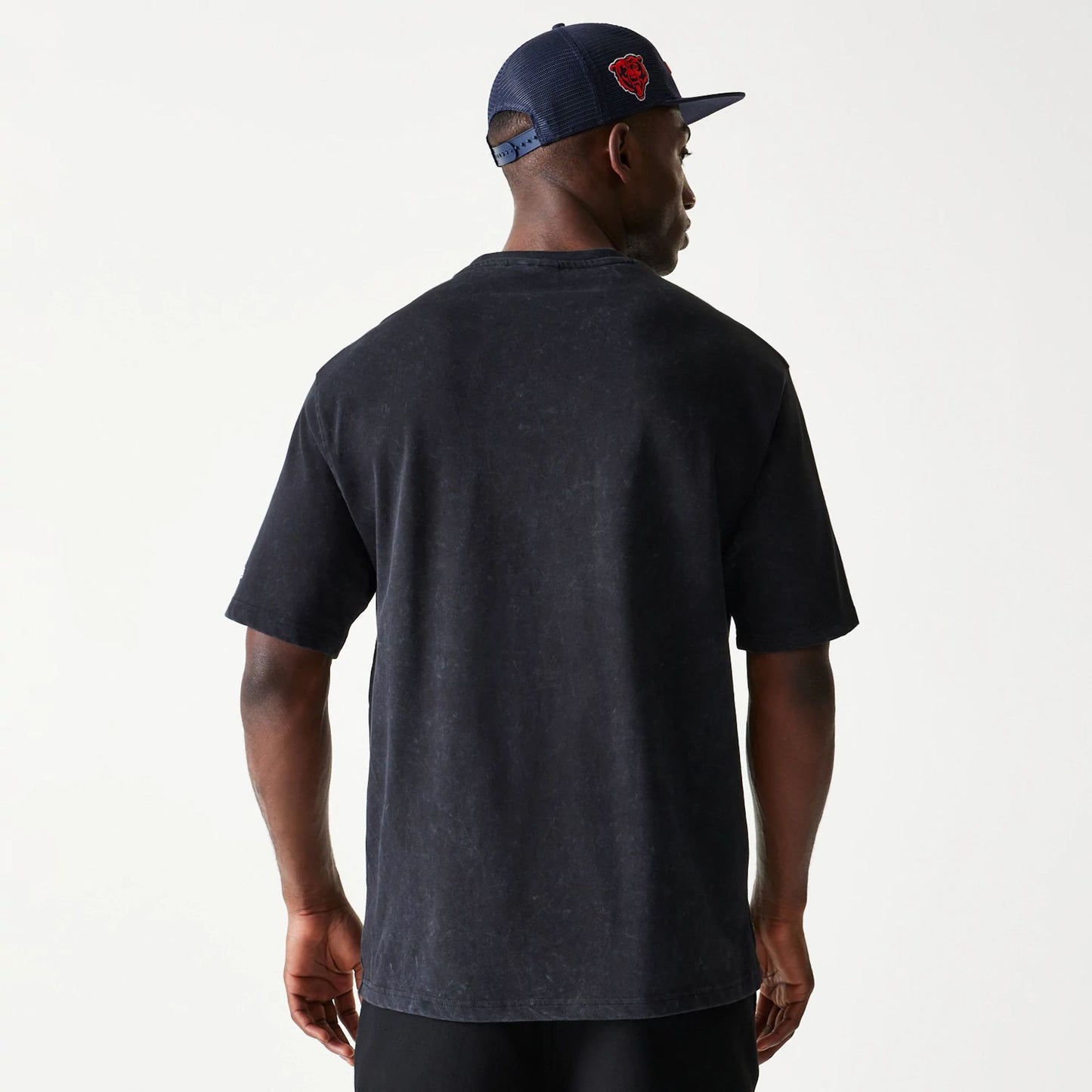 The Male model is wearing Chicago Bears NFL Games Premium Apparel Black Oversized T-Shirt 7