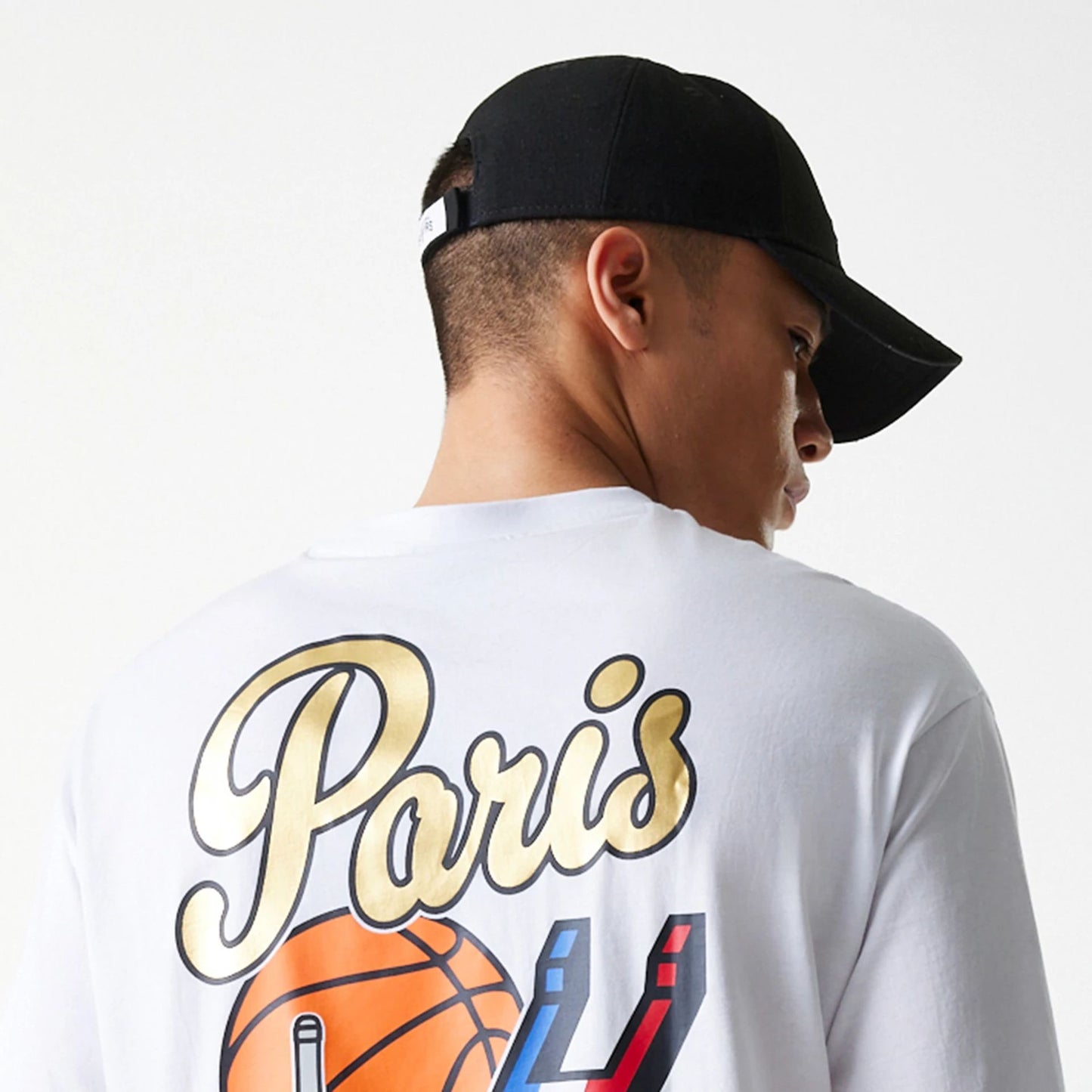 The Male model is wearing San Antonio Spurs NBA Paris Games 2025 White T-Shirt 7