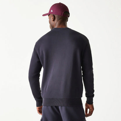 The Male model is wearing New Era Essential Brushed Fleece Navy Crewneck Sweater 2