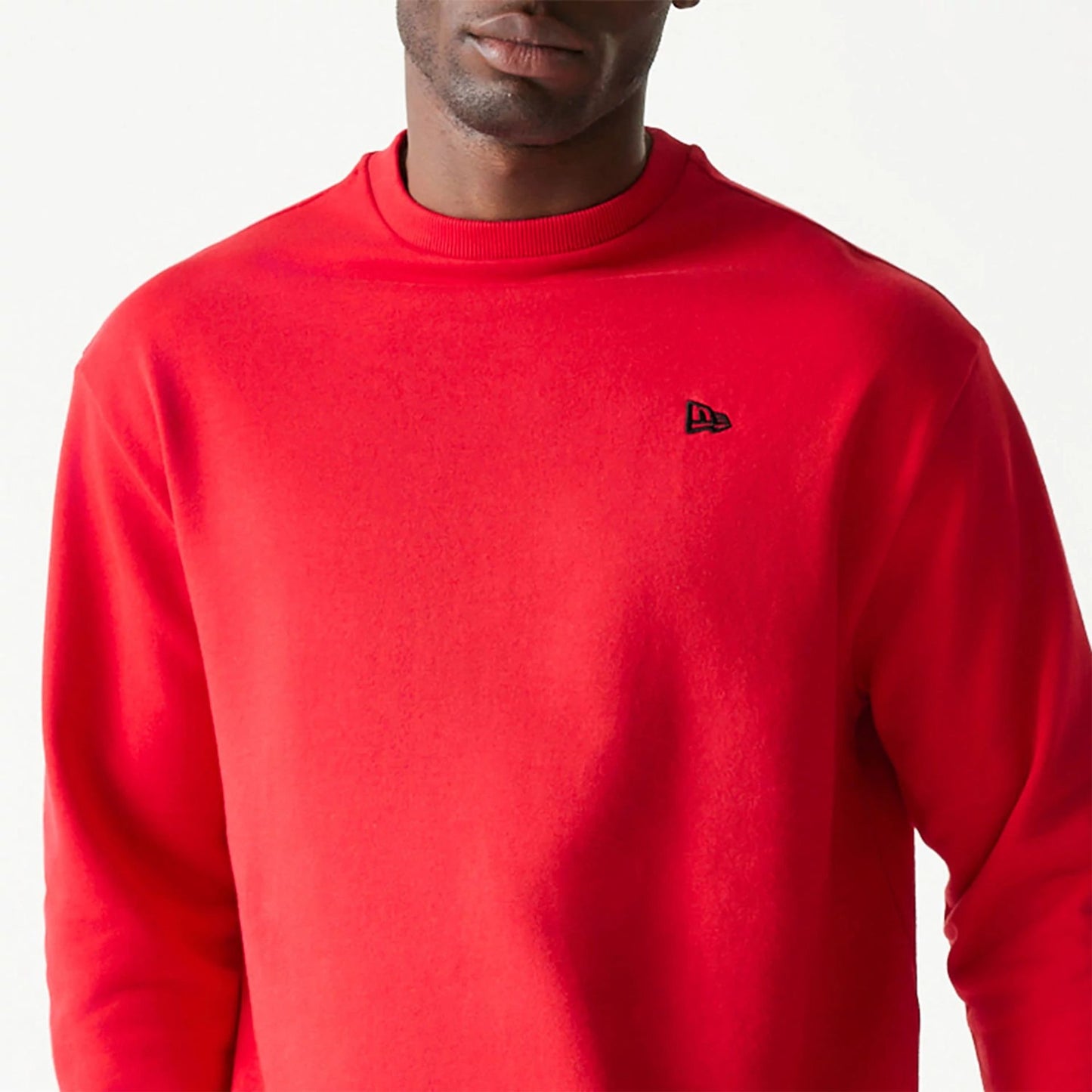 The Male model is wearing New Era Essential Red Crewneck Sweater 3