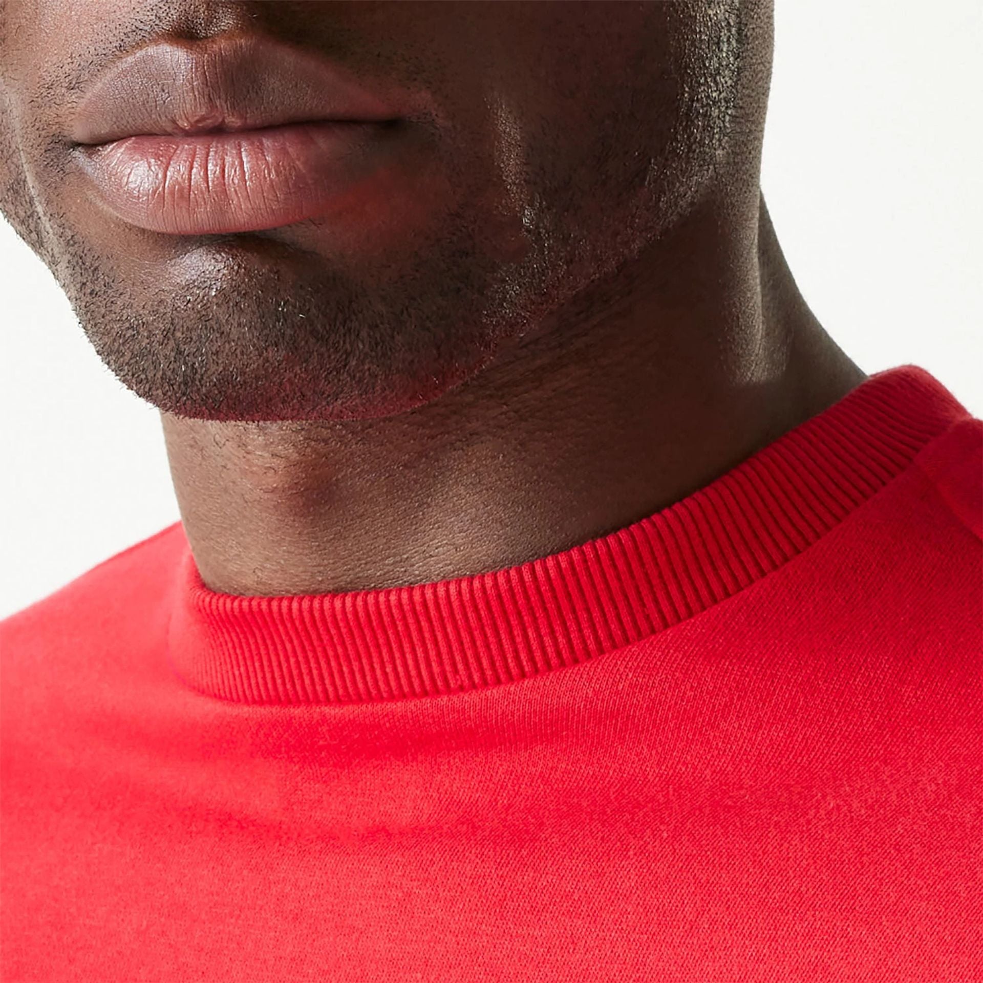 The Male model is wearing New Era Essential Red Crewneck Sweater 6