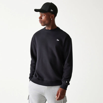 The Male model is wearing New Era Essential Black Crewneck Sweater 1