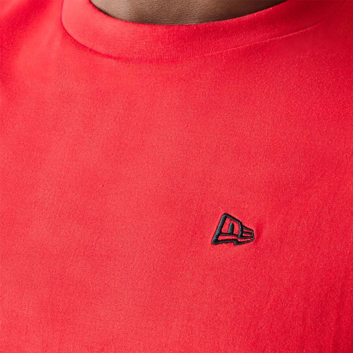 The Male model is wearing New Era Essential Red Oversized T-Shirt 4