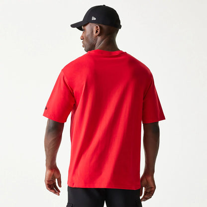 The Male model is wearing New Era Essential Red Oversized T-Shirt 2