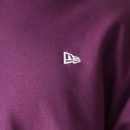 The Male model is wearing New Era Essential Brushed Fleece Dark Purple Crewneck Sweater 5