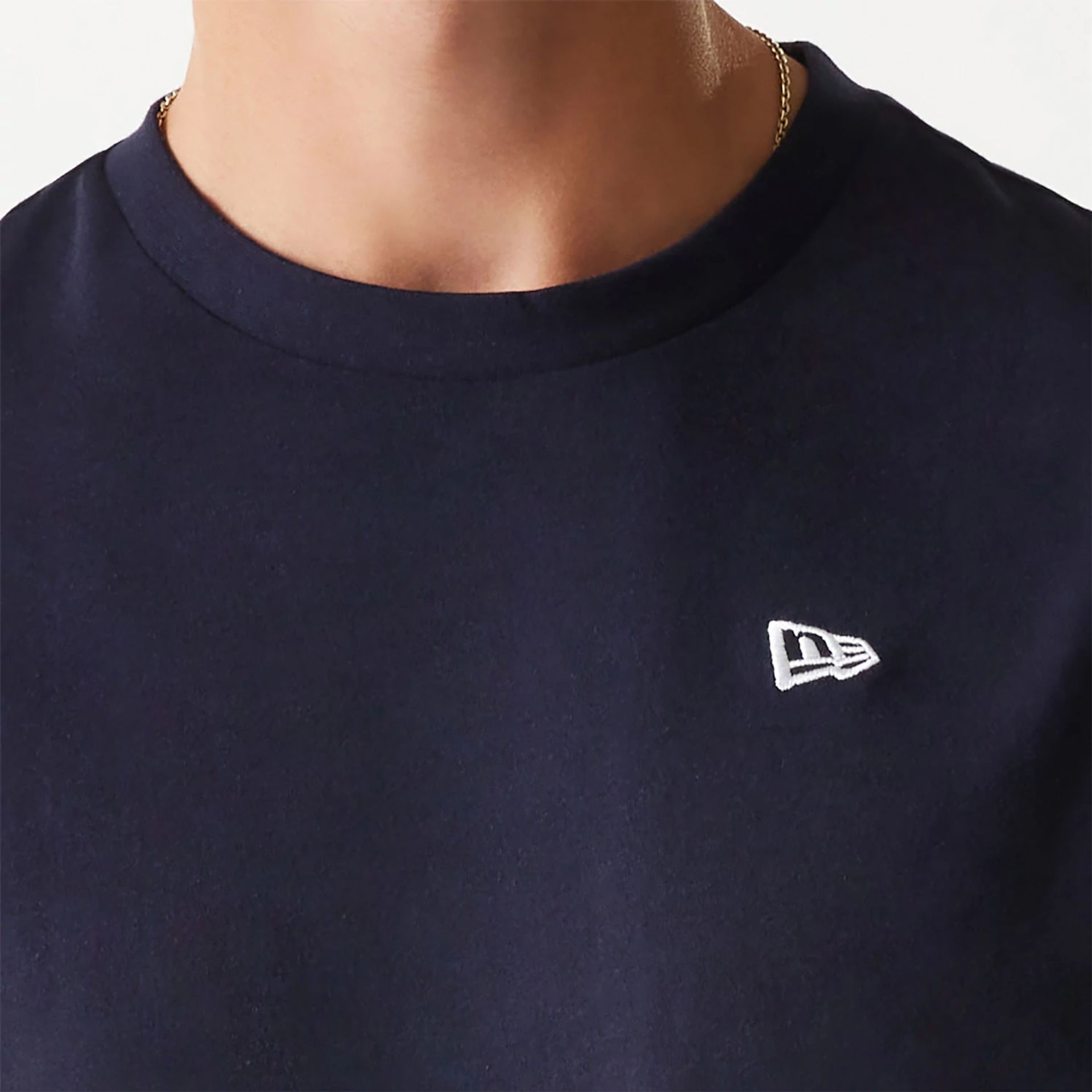 The Male model is wearing New Era Essential Navy Oversized T-Shirt 6