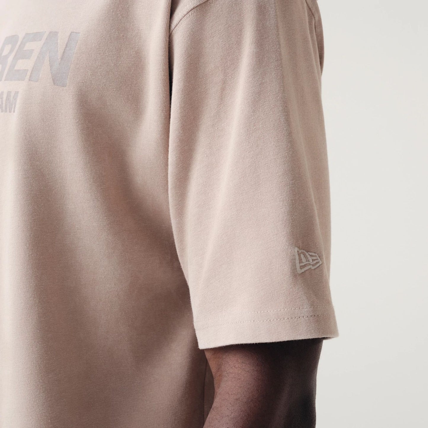 The Male model is wearing McLaren Racing Washed Pack Beige Oversized T-Shirt 5