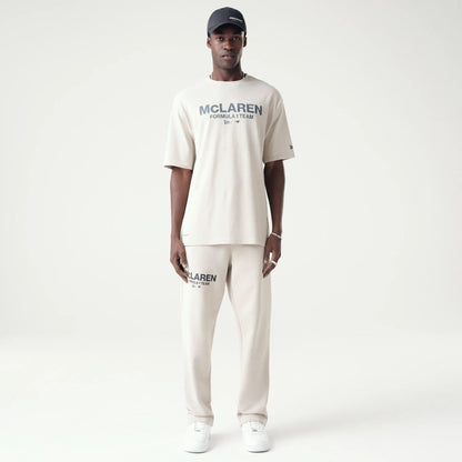 The Male model is wearing McLaren Racing Washed Pack Cream Oversized T-Shirt 8