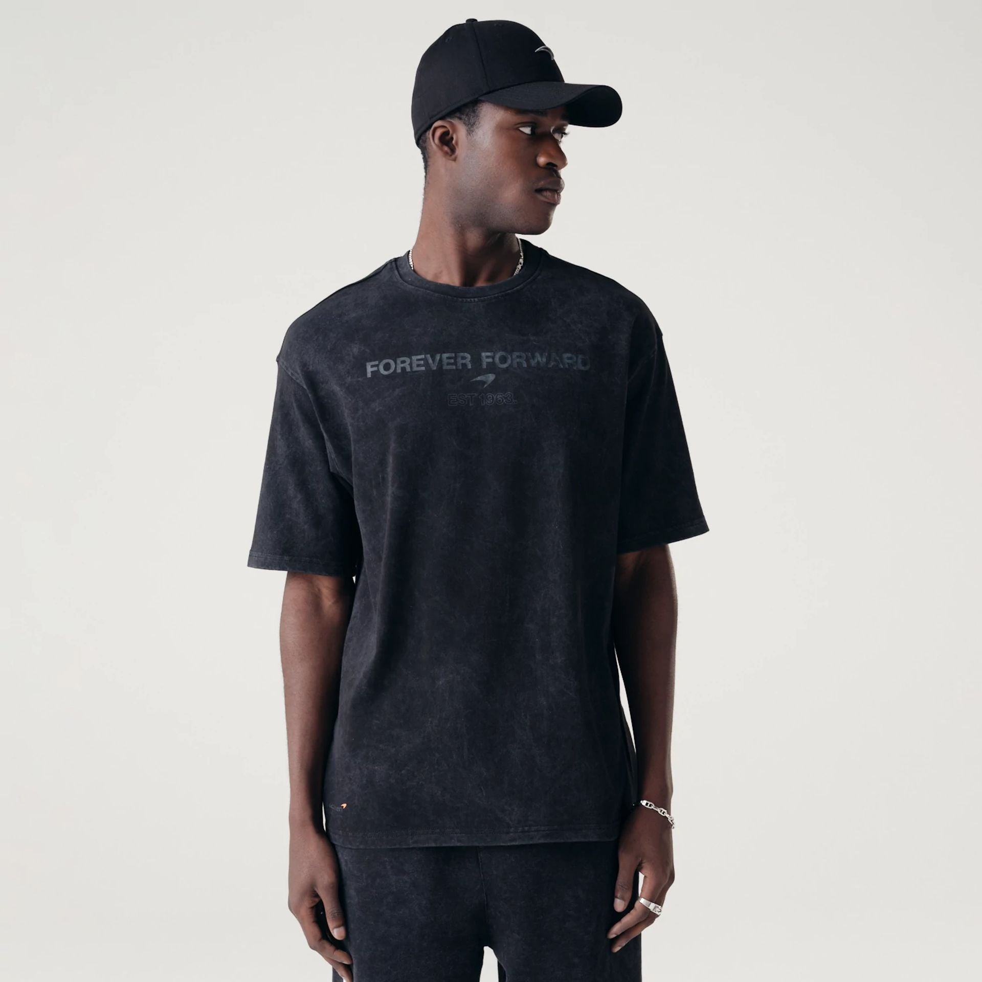 The Male model is wearing McLaren Racing Washed Pack Black Oversized T-Shirt 1