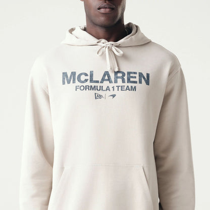 The Male model is wearing McLaren Racing Washed Pack Cream Oversized Hoodie 7