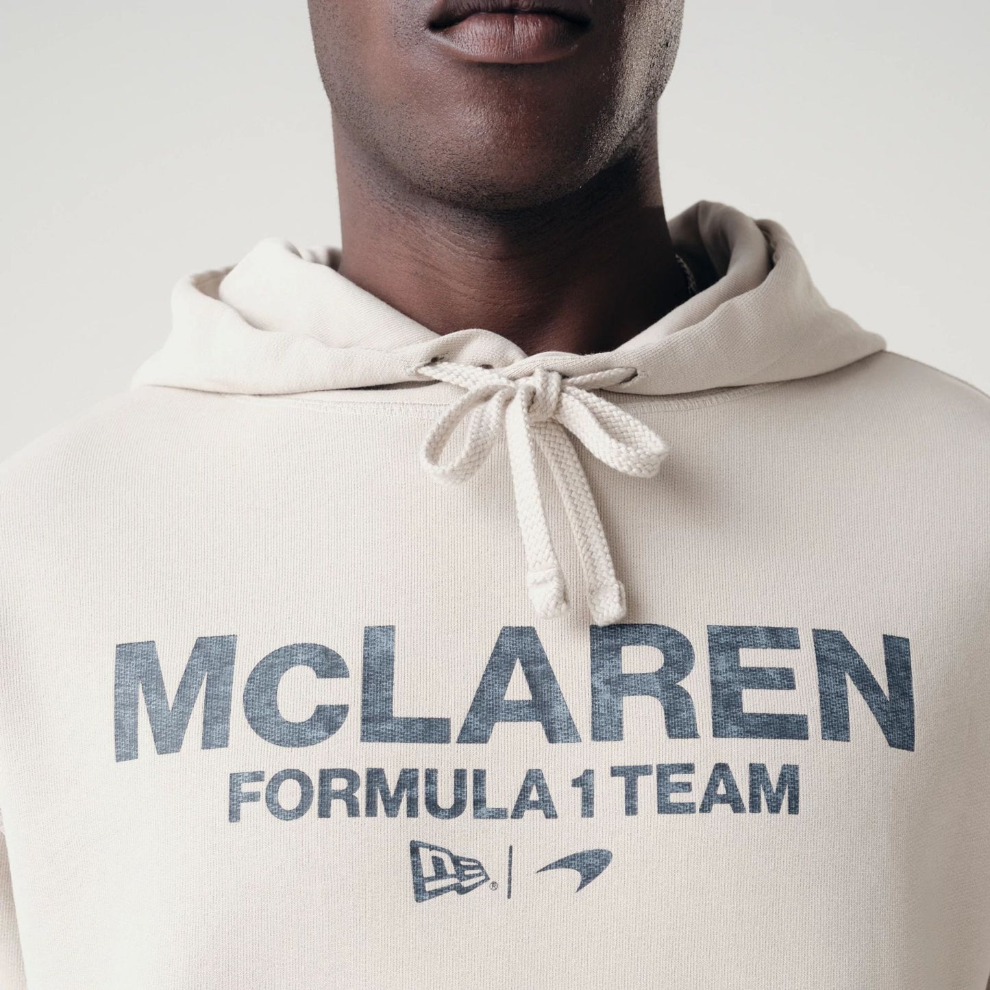 The Male model is wearing McLaren Racing Washed Pack Cream Oversized Hoodie 8