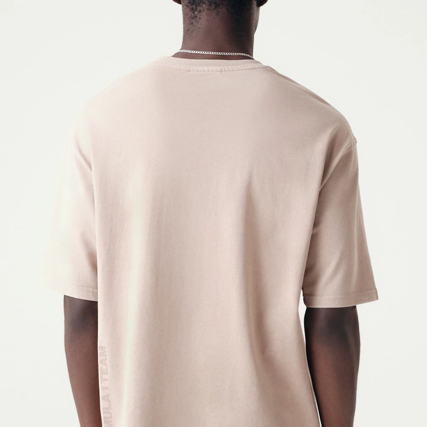 The Male model is wearing McLaren Racing Washed Pack Beige Oversized T-Shirt 7