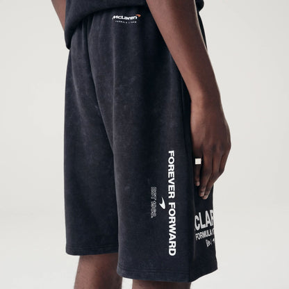 The Male model is wearing McLaren Racing Washed Pack Black Oversized Shorts 7