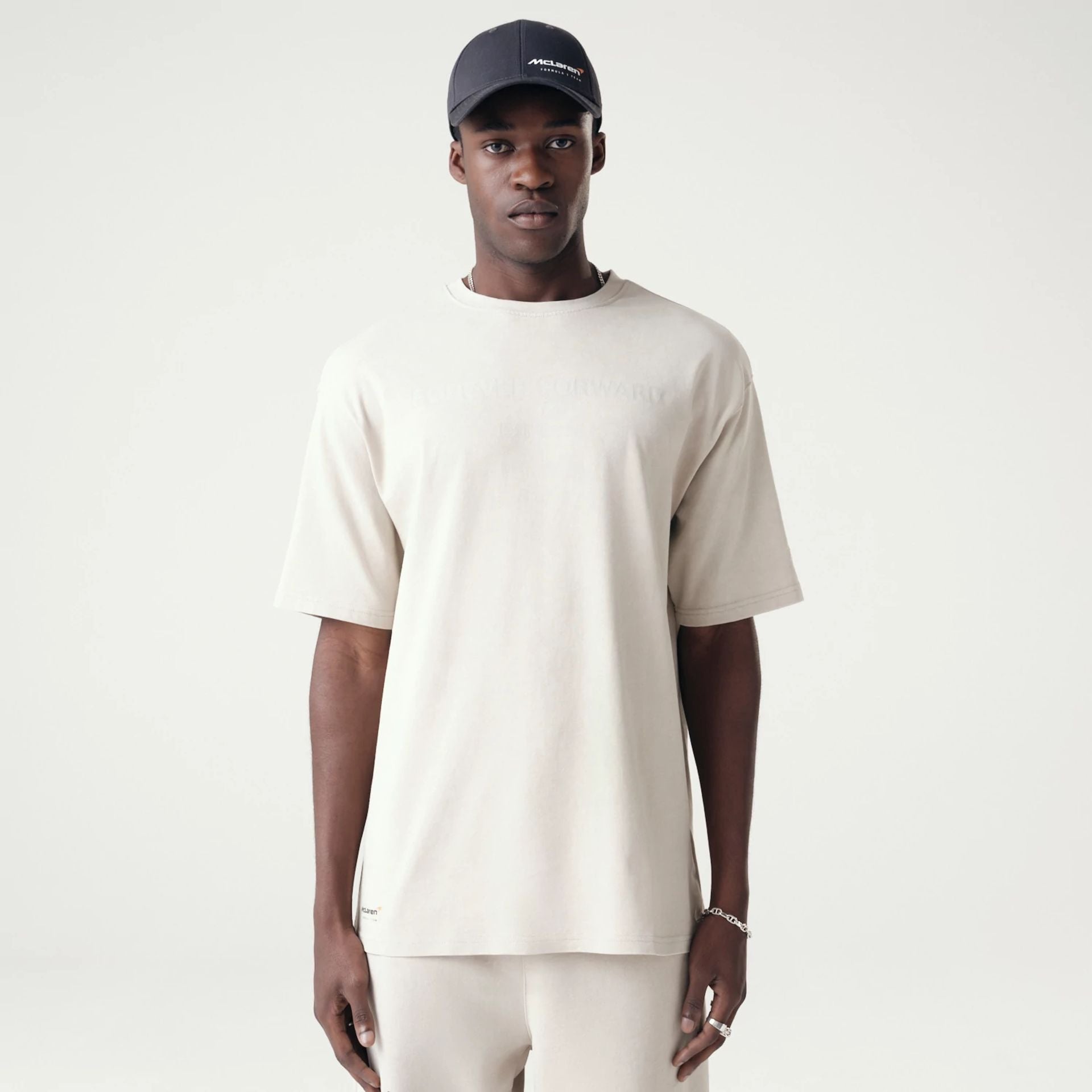 The Male model is wearing McLaren Racing Washed Pack Stone Oversized T-Shirt 1