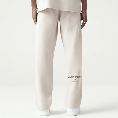 The Male model is wearing McLaren Racing Washed Pack Cream Straight Leg Joggers 2