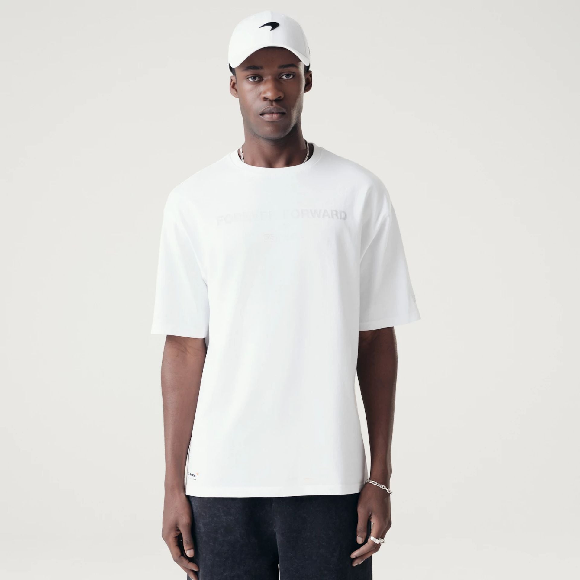 The Male model is wearing McLaren Racing Washed Pack White Oversized T-Shirt 1