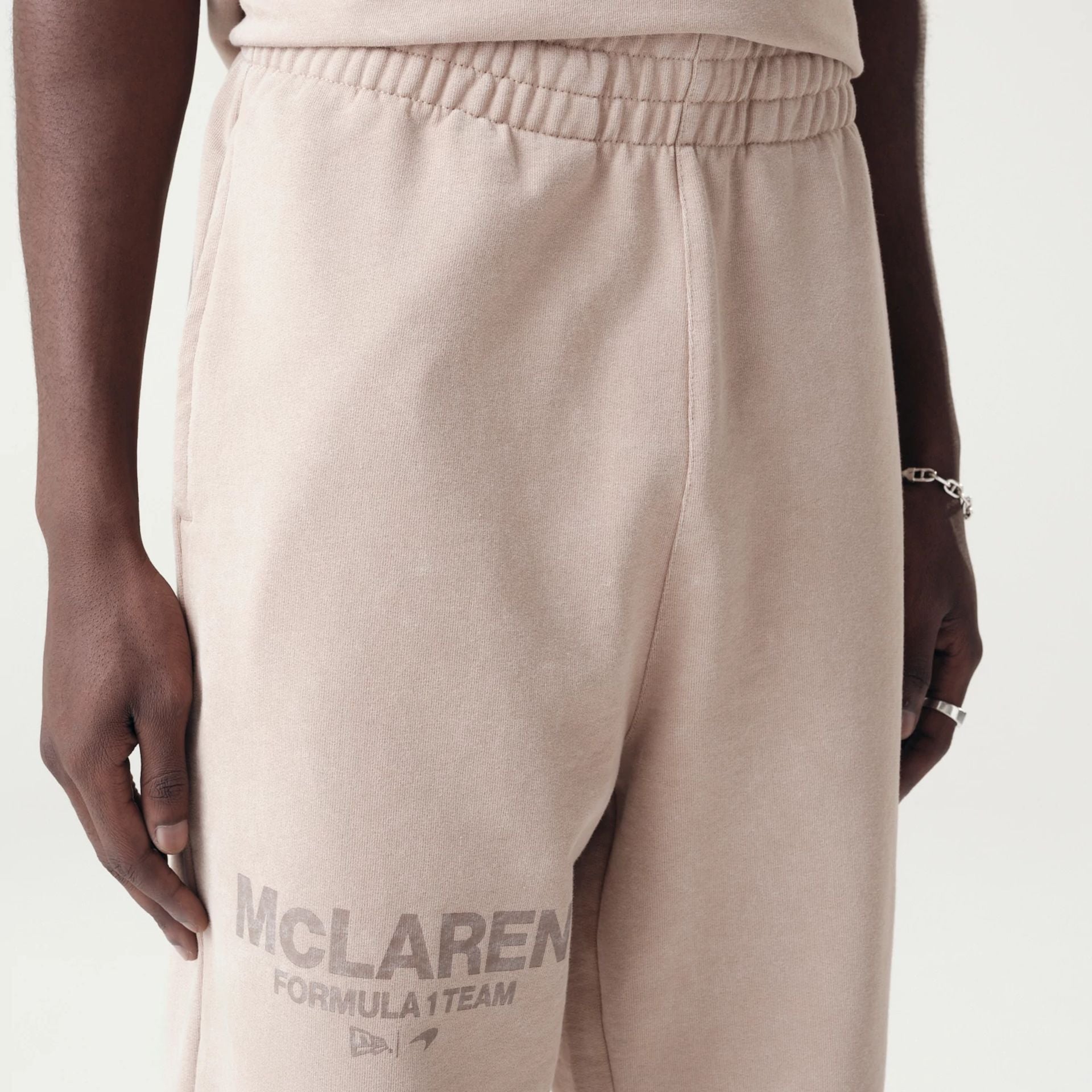 The Male model is wearing McLaren Racing Washed Pack Beige Straight Leg Joggers 6