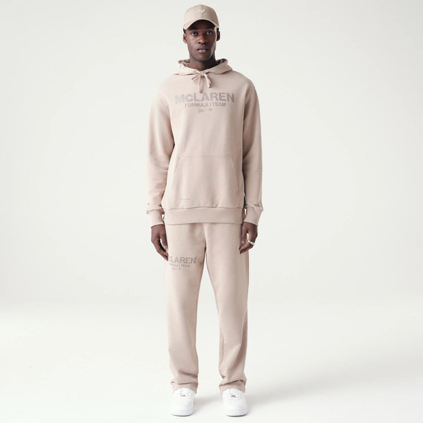 The Male model is wearing McLaren Racing Washed Pack Beige Oversized Hoodie 8