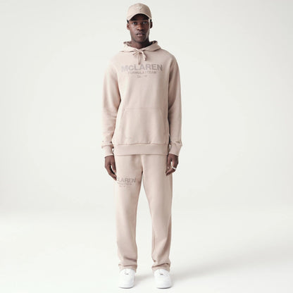 The Male model is wearing McLaren Racing Washed Pack Beige Oversized Hoodie 8