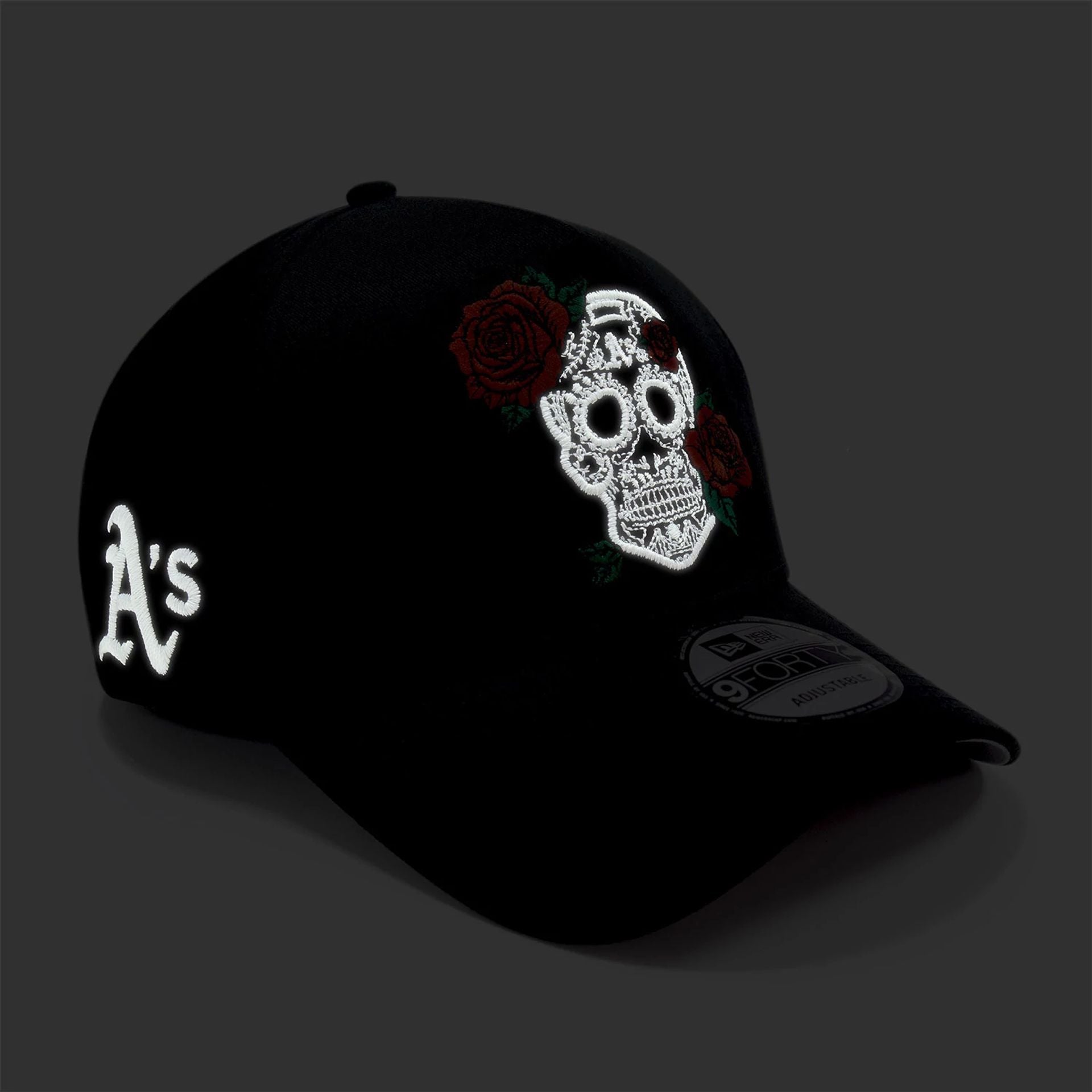 This is a Oakland Athletics Glow In The Dark Sugar Skull Black 9FORTY E-Frame Adjustable Cap 2