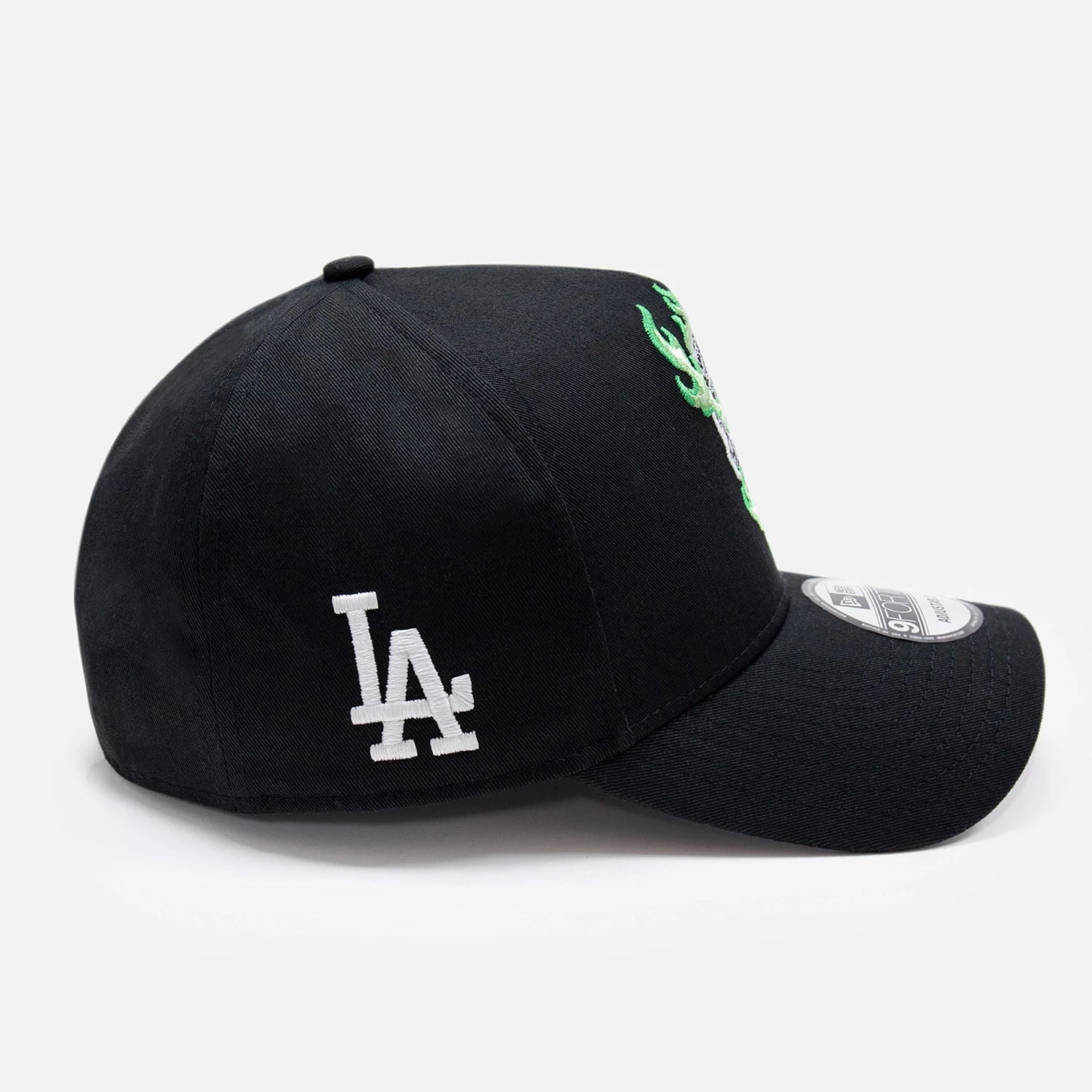 This is a LA Dodgers Glow In The Dark Flaming Skull Black 9FORTY E-Frame Cap 8