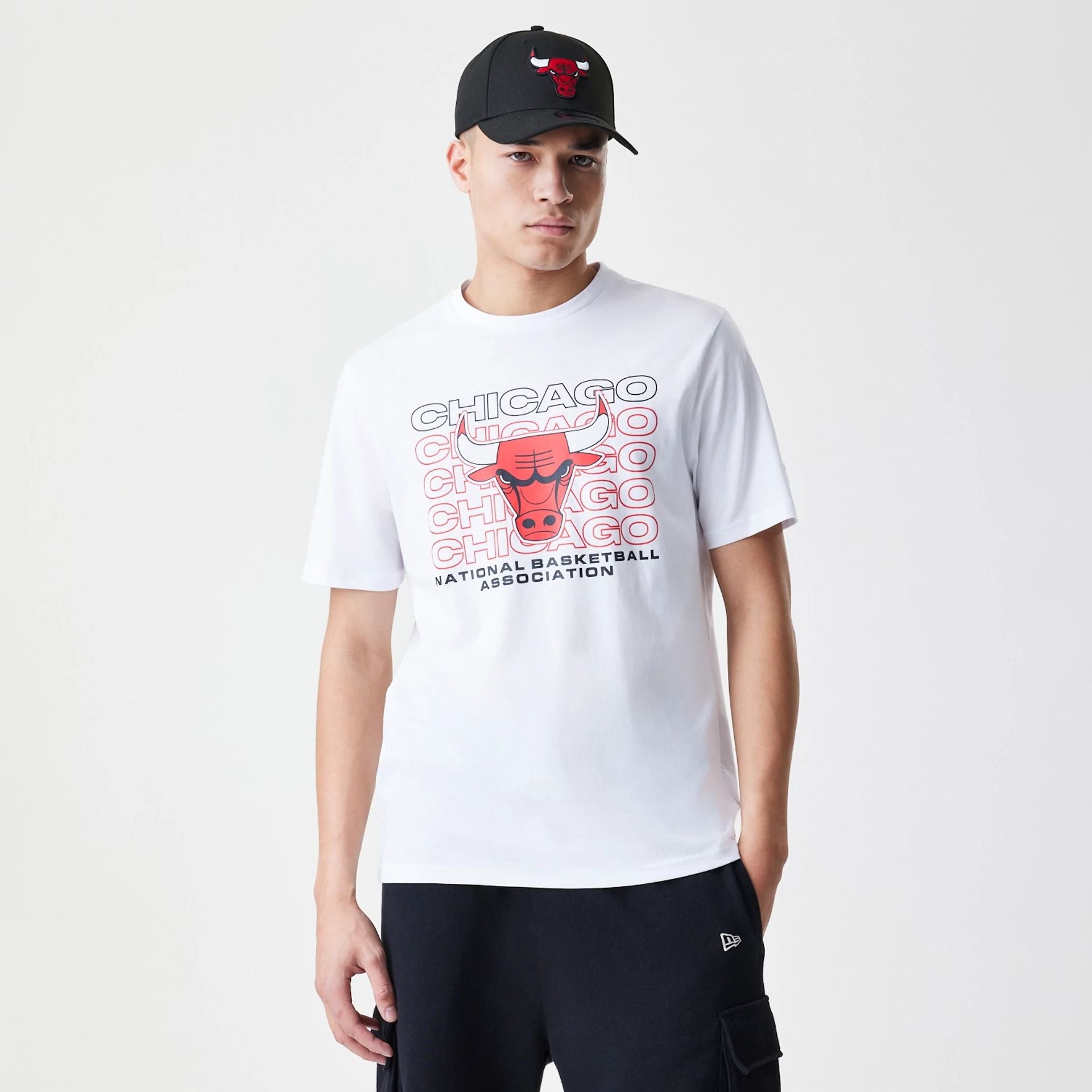 The Male model is wearing Chicago Bulls NBA Stack Wordmark White T-Shirt 1