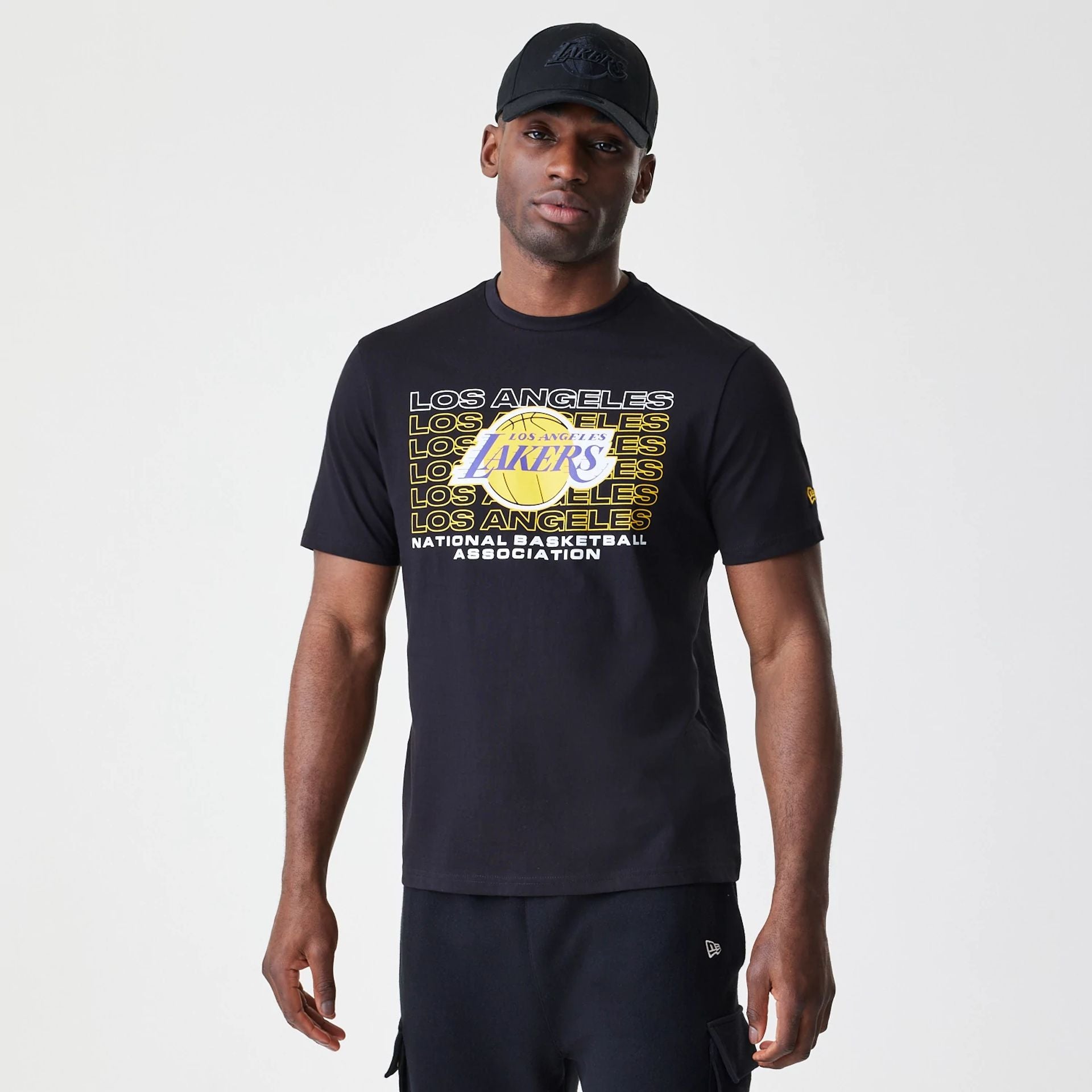 The Male model is wearing LA Lakers NBA Stack Wordmark Black T-Shirt 1