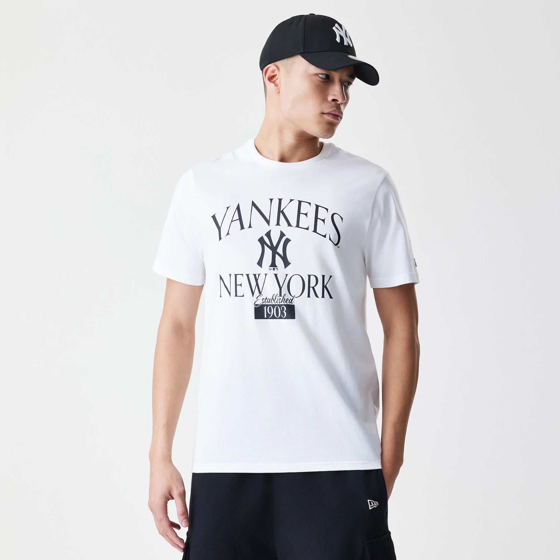 The Male model is wearing New York Yankees MLB Arch Wordmark White T-Shirt 1