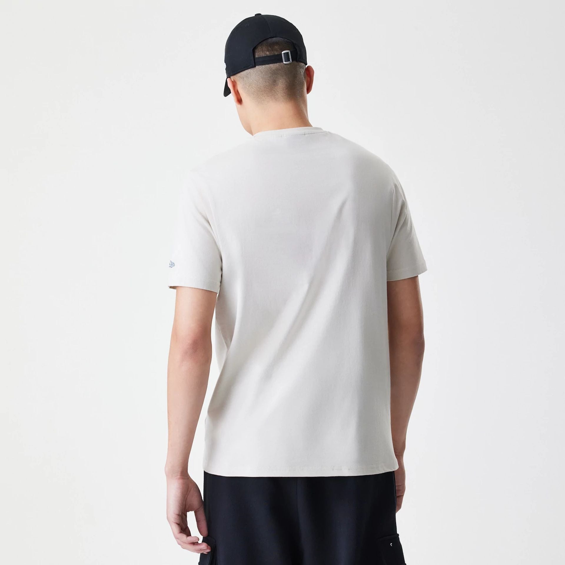 The Male model is wearing New Era Burger Graphic Cream T-Shirt 2