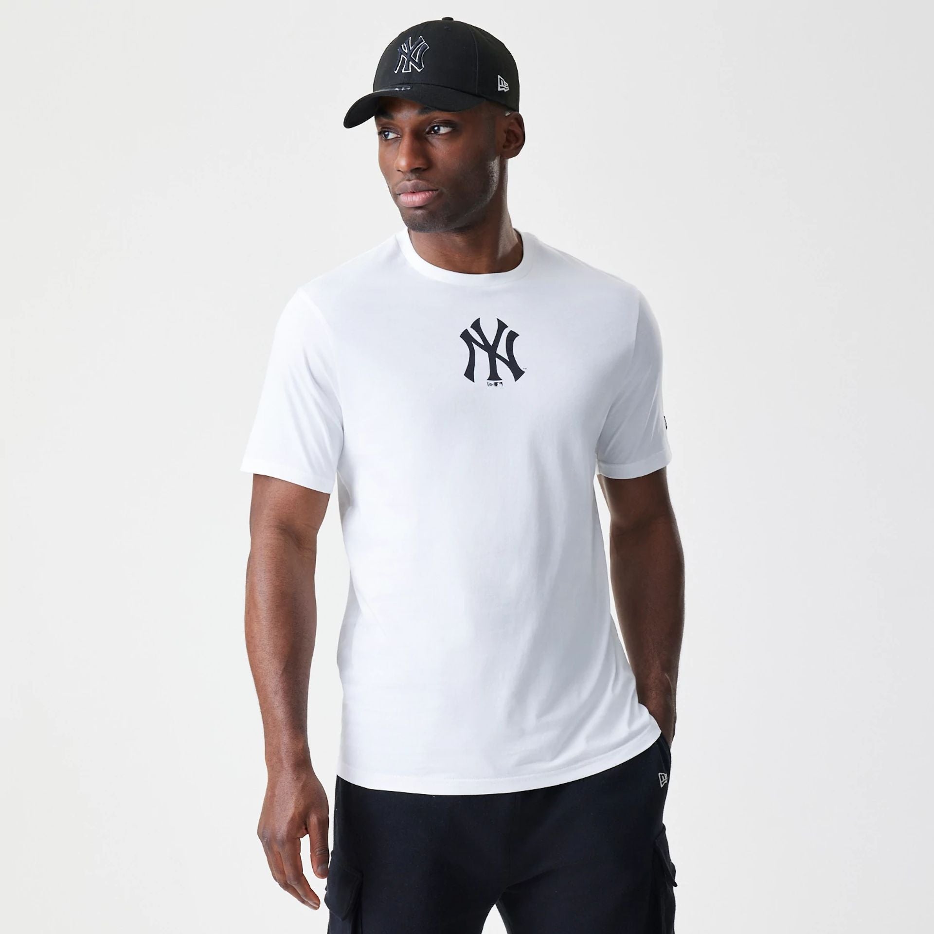 The Male model is wearing New York Yankees MLB Logo White T-Shirt 1