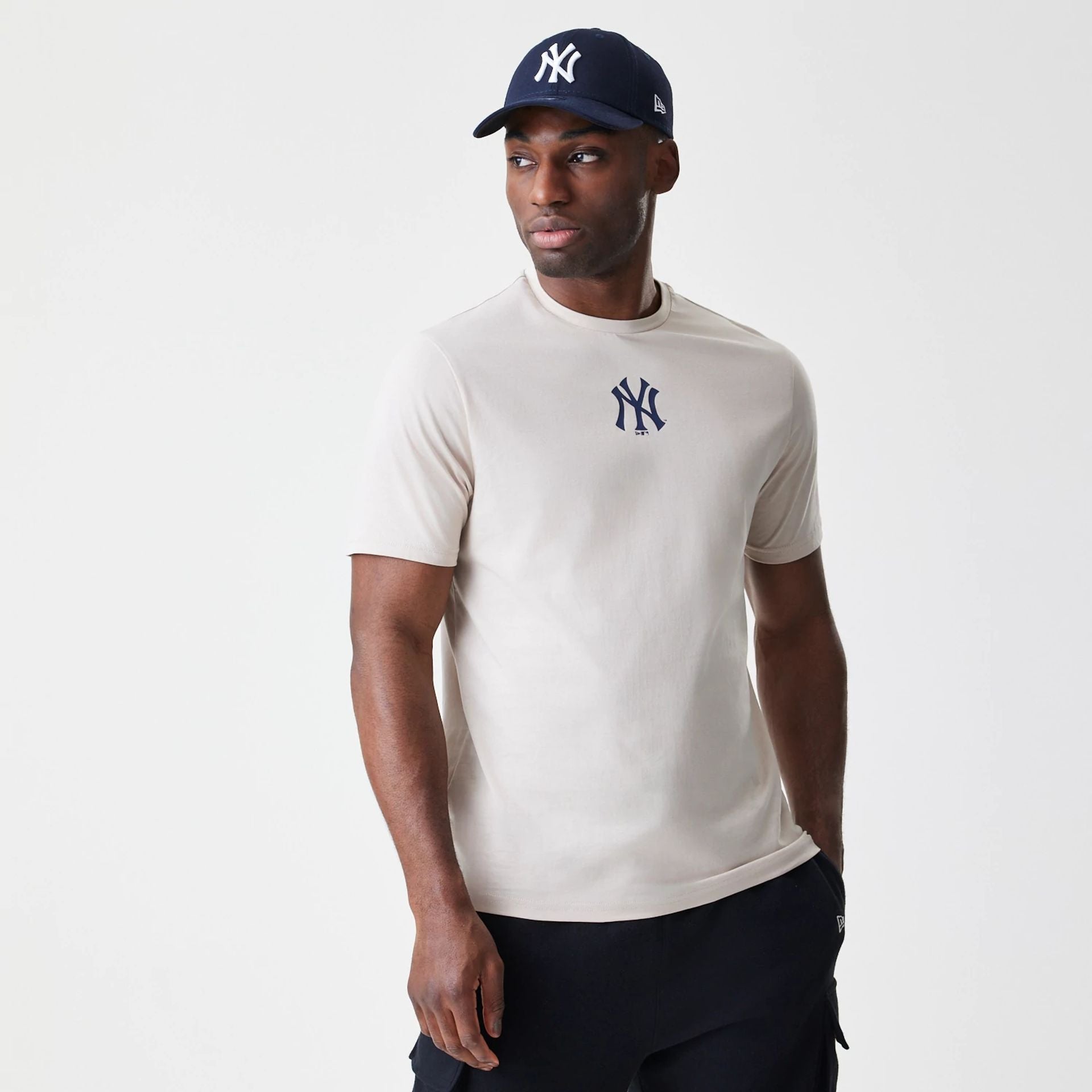 The Male model is wearing New York Yankees MLB Logo Cream T-Shirt 1