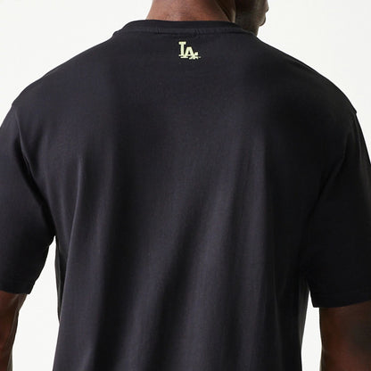 The Male model is wearing LA Dodgers MLB Glow Black Oversized T-Shirt 8