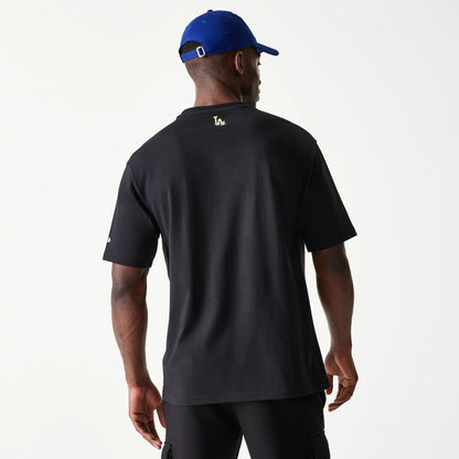 The Male model is wearing LA Dodgers MLB Glow Black Oversized T-Shirt 3