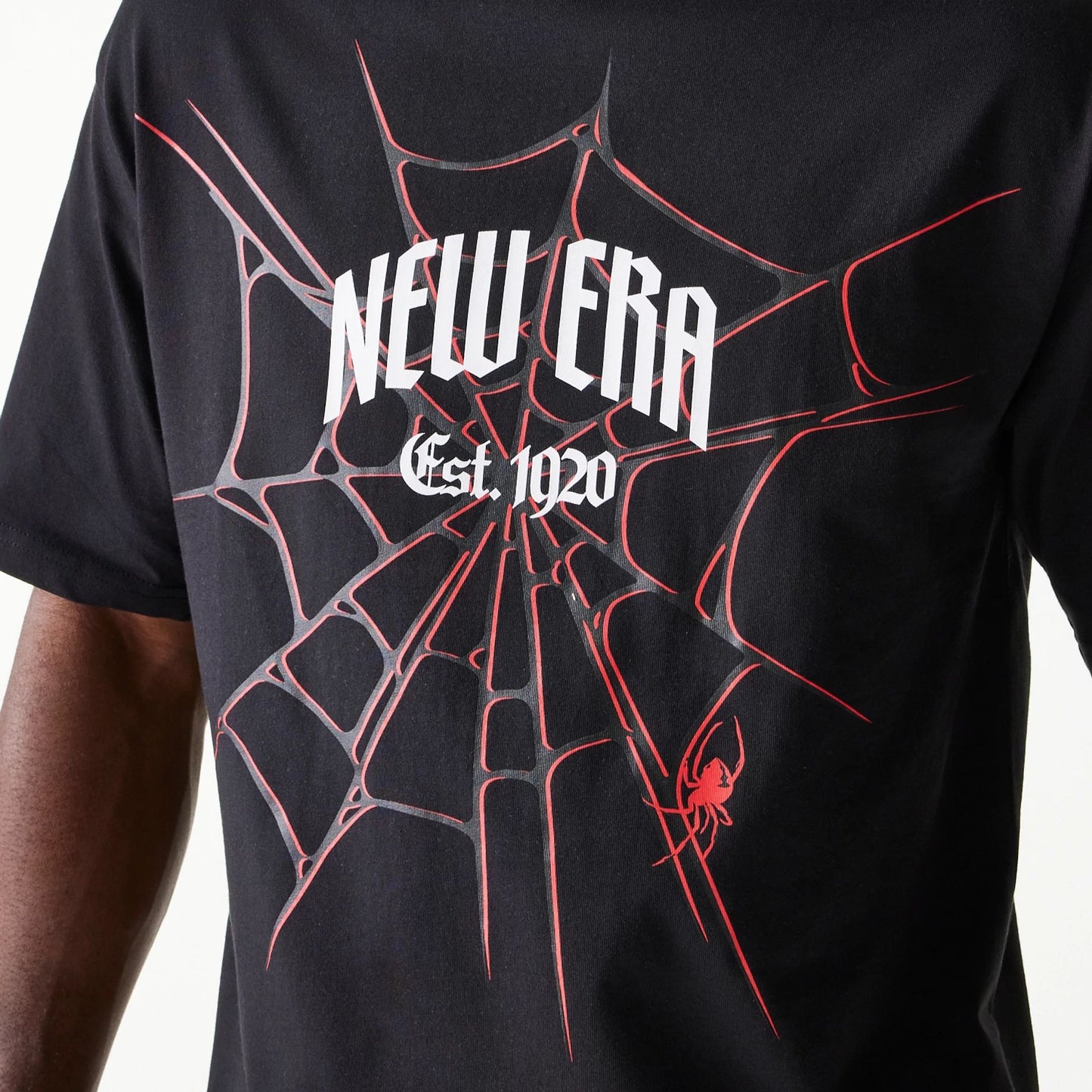 The Male model is wearing New Era Spiderweb Black Oversized T-Shirt 4